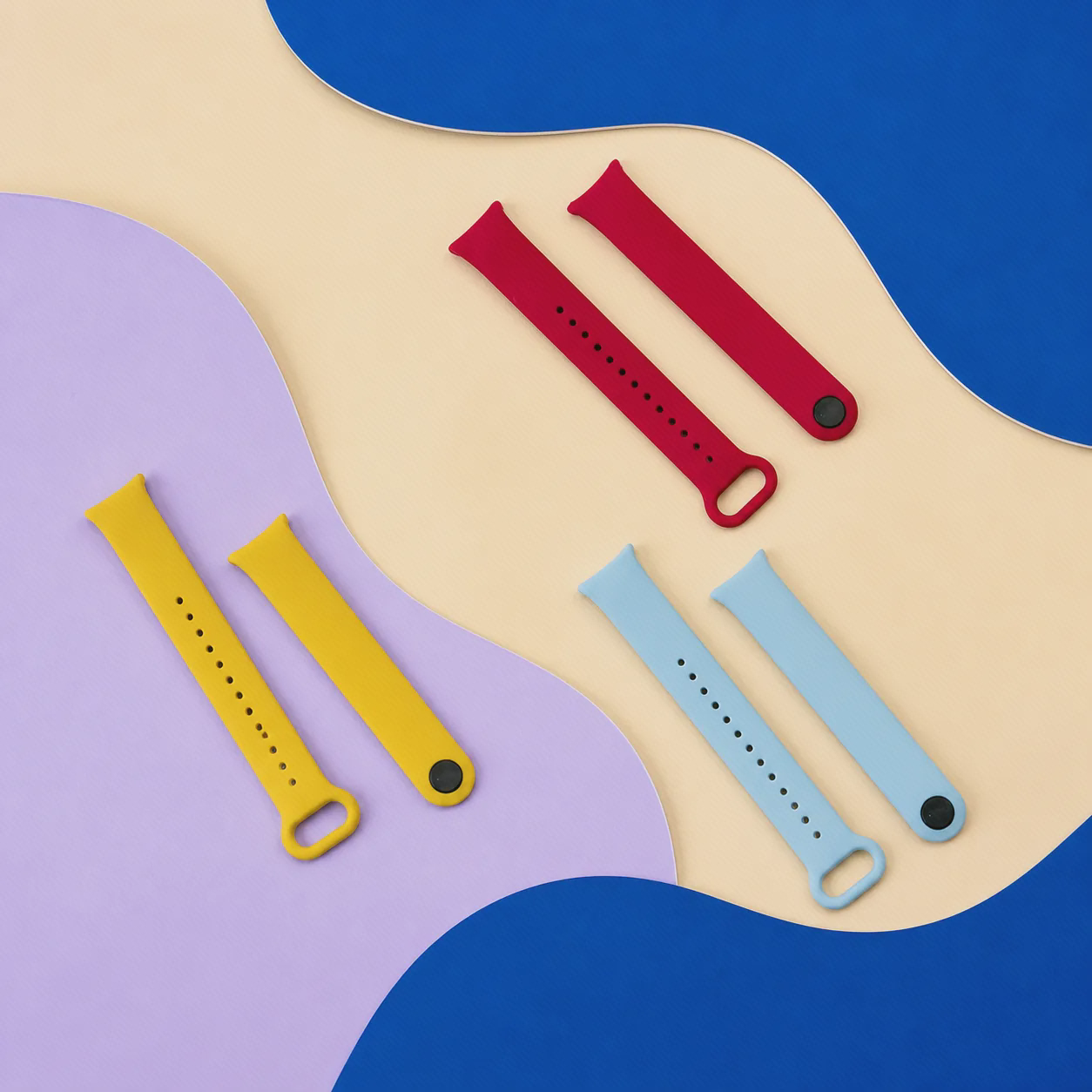 مقایسه رنگ بندهای سیلیکونی Xiaomi Mi Band 8 سه بند سیلیکونی دو تکه Mi Band 8 به رنگ قرمز زرد و آبی روشن