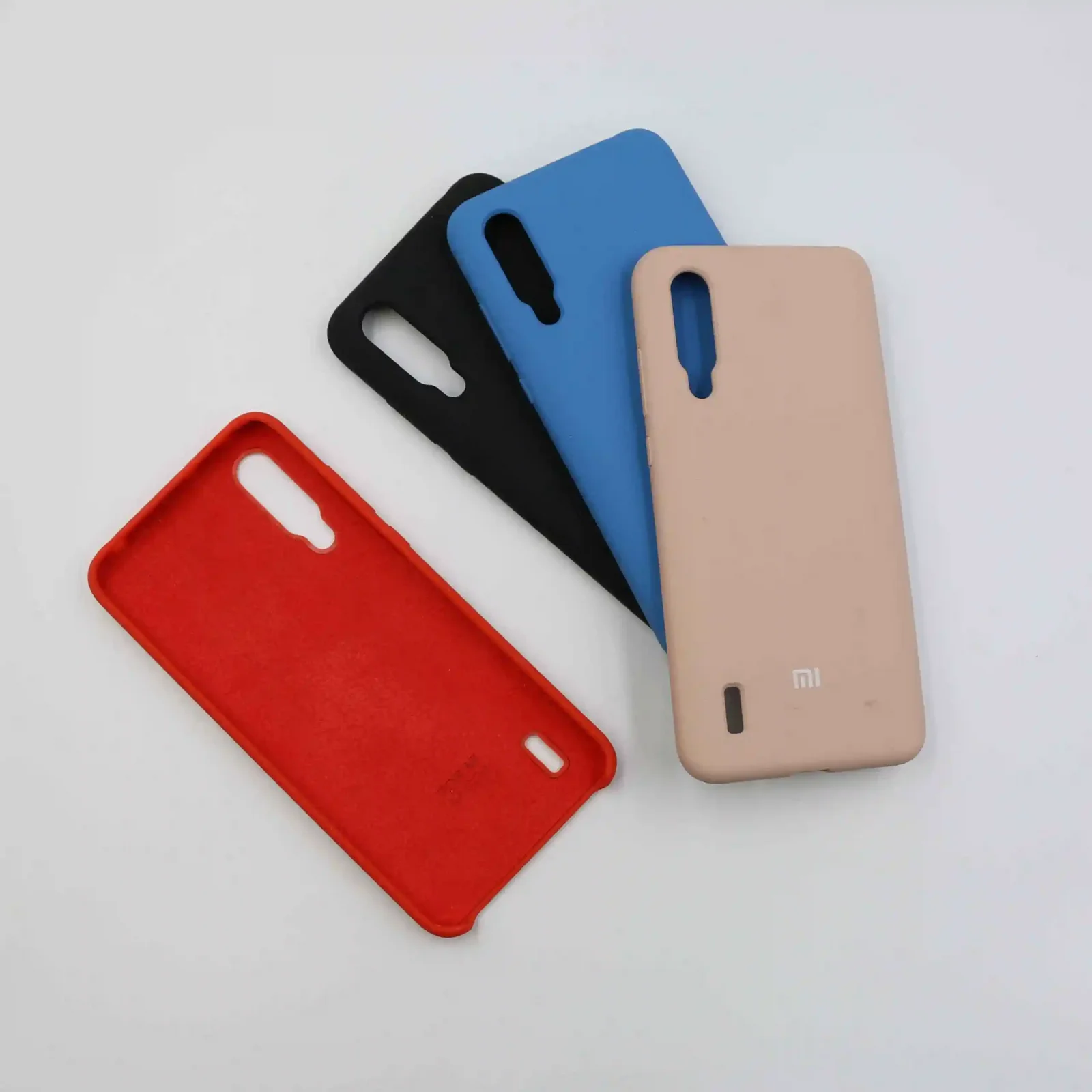 مجموعه کاور سیلیکونی شیائومی Mi 9 Lite در چهار رنگ قرمز مشکی آبی و صورتی