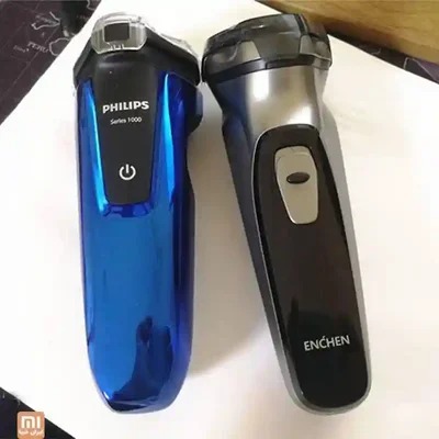 مقایسه ریش‌تراش Enchen Blackstone مشکی با Philips Series 1000 آبی
