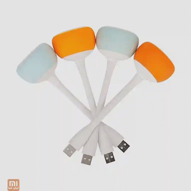 پشت چهار اسپیکر کوچک Youpin Velev M83 نارنجی و سبز با کابل USB انعطاف‌پذیر