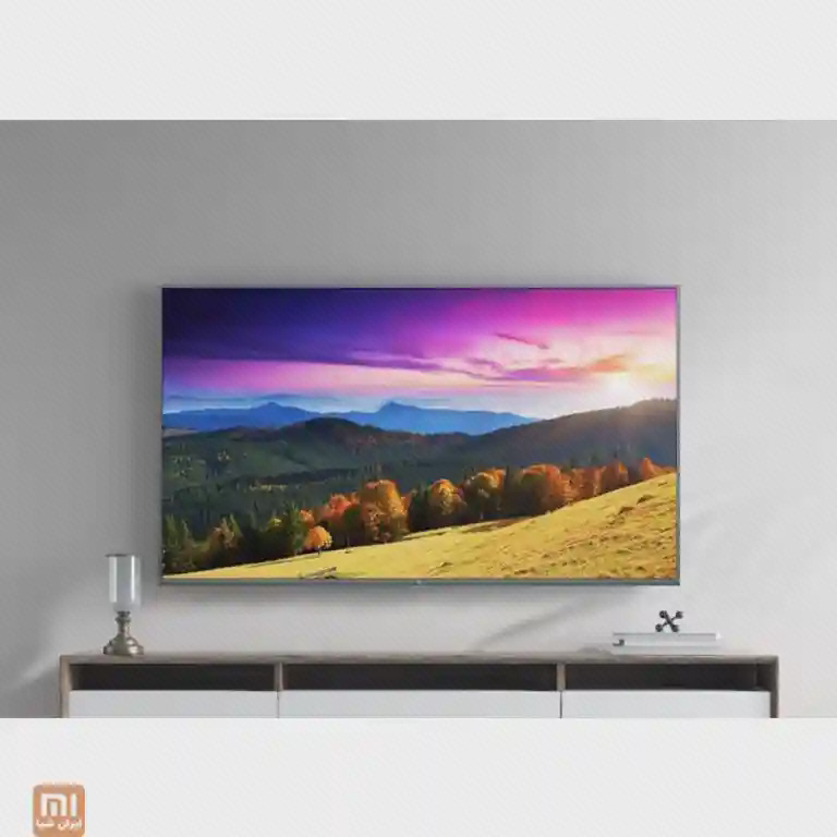 نصب دیواری تلویزیون هوشمند Xiaomi 4S 65 اینچ تلویزیون 65 اینچ شیائومی 4S نصب شده روی دیوار بالای میز تلویزیون