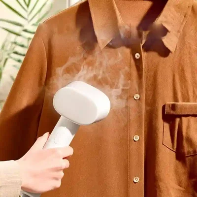 بخاردهی پیراهن قهوه‌ای با اتو بخار دستی Mijia ZQGTJ02KL شیائومی