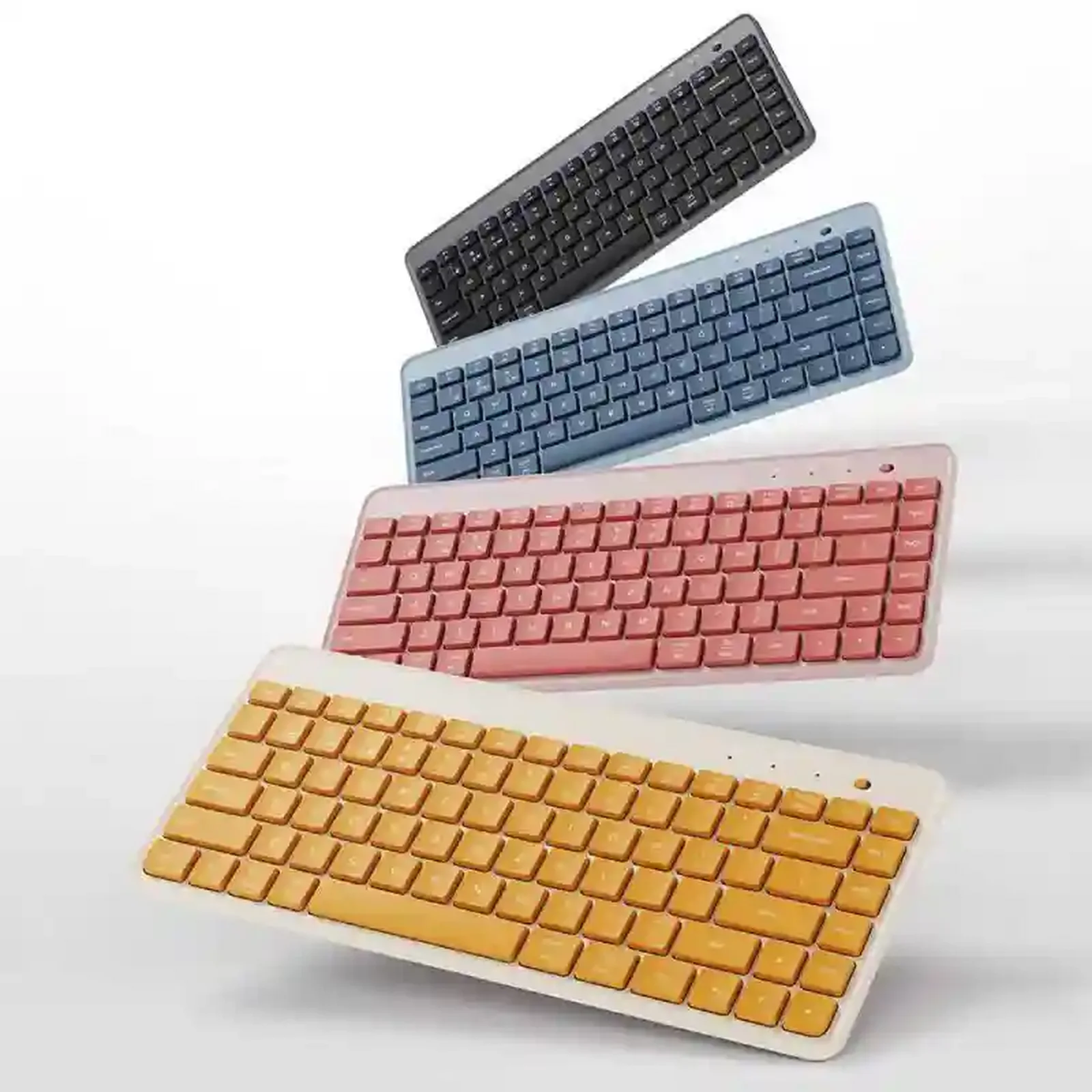 چهار رنگ کیبورد دوحالته قابل حمل Xiaomi MXBXJP01YM رنگبندی کیبورد شیائومی MXBXJP01YM خاکستری آبی صورتی و زرد