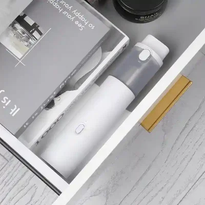 طراحی جمع و جور جارو خودرو شیائومی Lydsto H1 جارو شارژی Lydsto H1 سفید داخل کشوی لوازم خانه