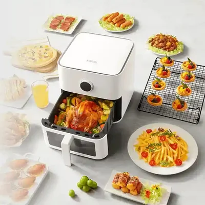 پخت مرغ و غذاهای متنوع با Xiaomi Smart Air Fryer MAF15 سبد باز هواپز شیائومی MAF15 با مرغ بریان و سبزیجات