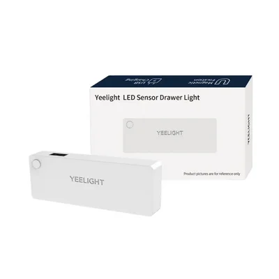 چراغ دراور شیائومی مدل Yeelight YLCTD001؛ نمای محصول و بستهبندی چراغ دراور شیائومی مدل Yeelight YLCTD001 کنار جعبه LED Sensor Drawer Light