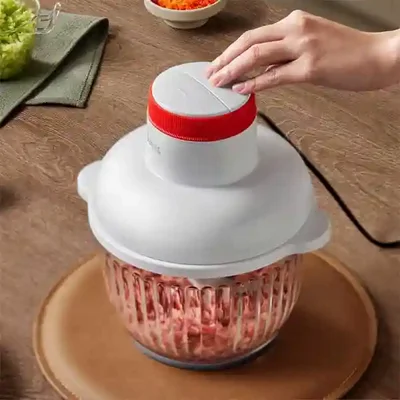 چرخ گوشت و غذاساز چندمنظوره شیائومی مدل Deerma JR10W هنگام فشردن کلید روی گوشت