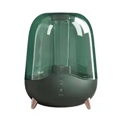 رطوبتساز شیائومی Deerma F329 از نمای روبهرو دستگاه بخور سبز Deerma F329 با مخزن شفاف و پایه طلایی