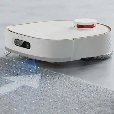 عملکرد Dreame W10 Pro روی سطح فرش جارو رباتیک Dreame W10 Pro در حال حرکت روی فرش خاکستری