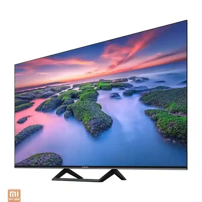 نمای سهرخ چپ تلویزیون شیائومی A2 تلویزیون Xiaomi A2 55 اینچ از زاویه سمت چپ با تصویر غروب دریا
