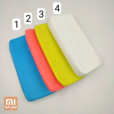 چهار رنگ کاور پاوربانک Redmi 20000mAh شامل آبی، قرمز، زرد و سفید