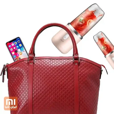 مخلوط‌کن قابل حمل Deerma NU05 کنار کیف دستی و گوشی موبایل