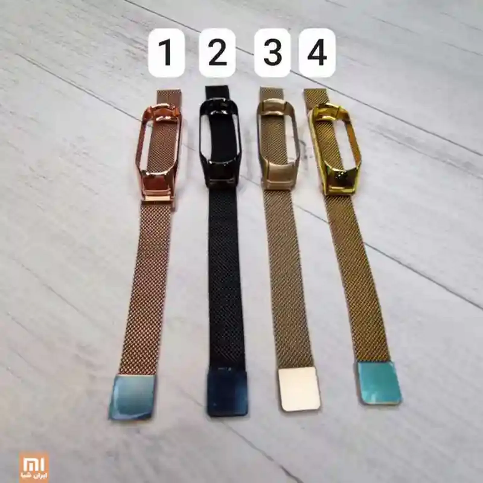 نمای مجموعه بندهای فلزی شیائومی Mi Band 5 چهار رنگ بند فلزی Mi Band 5 شیائومی با قاب کپسول