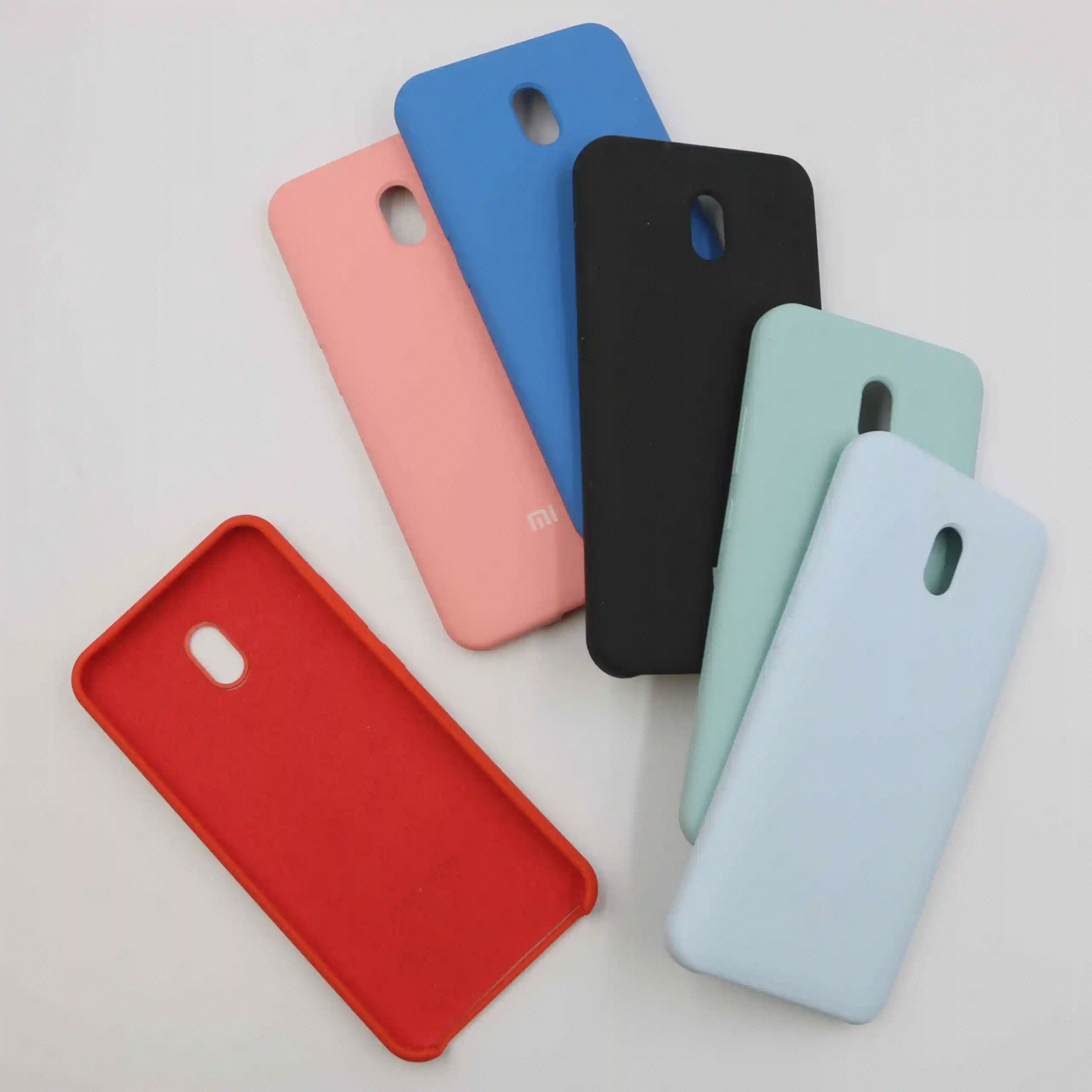 رنگبندی قاب ردمی 8A کاورهای رنگی Redmi 8A کنار هم با نمایش سطح داخلی قاب قرمز