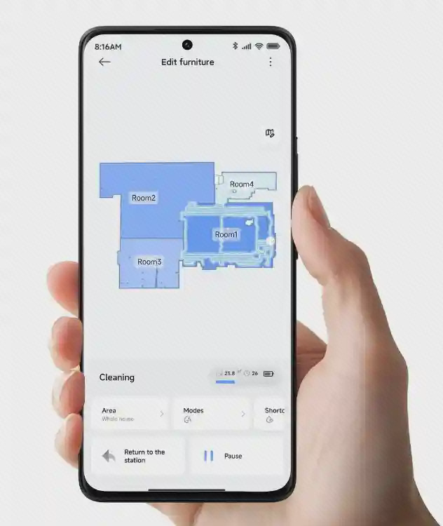 نمای نقشه نظافت Xiaomi H50 در گوشی گوشی در دست با نقشه آبی اتاقها در صفحه Edit Furniture برنامه Xiaomi H50