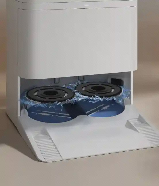 نمای شستوشوی تی در پایه Xiaomi H50 دو تی گرد داخل بخش باز پایه Xiaomi H50 با افکت آب آبی در تصویر نمایشی