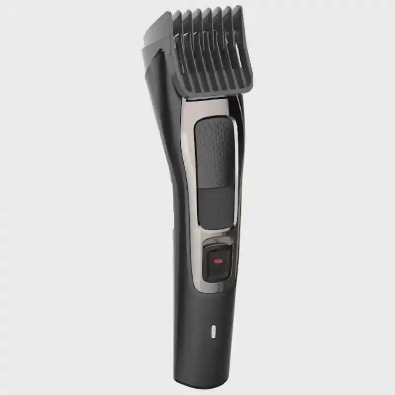 نمای کامل Sharp 3S ماشین اصلاح مشکی Sharp 3S با شانهٔ راهنما، کلید جلو و نشانگر پایین بدنه