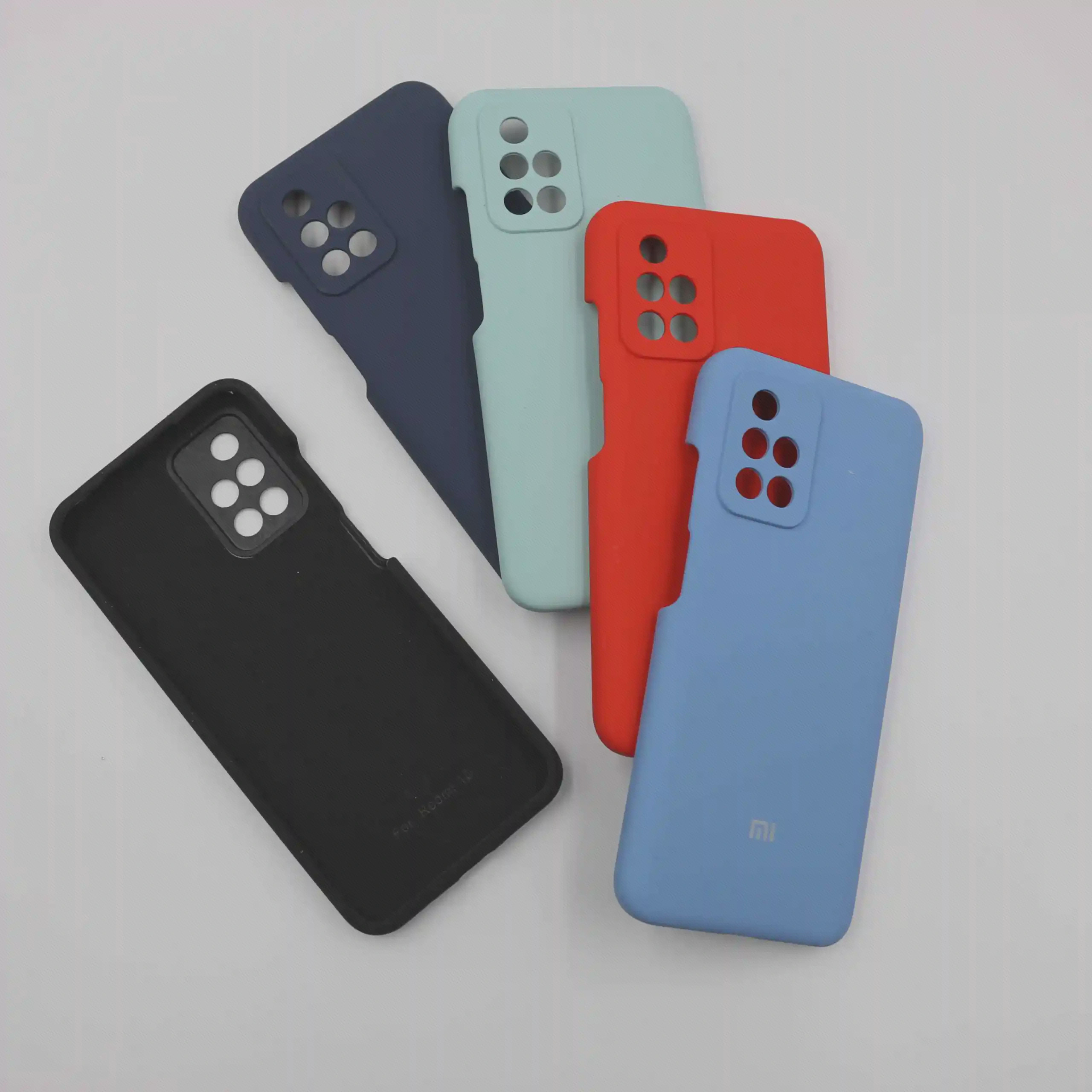 رنگبندی و داخل کاور Redmi 10 قابهای رنگی Redmi 10 کنار نمای داخلی قاب مشکی با بافت پارچهمانند