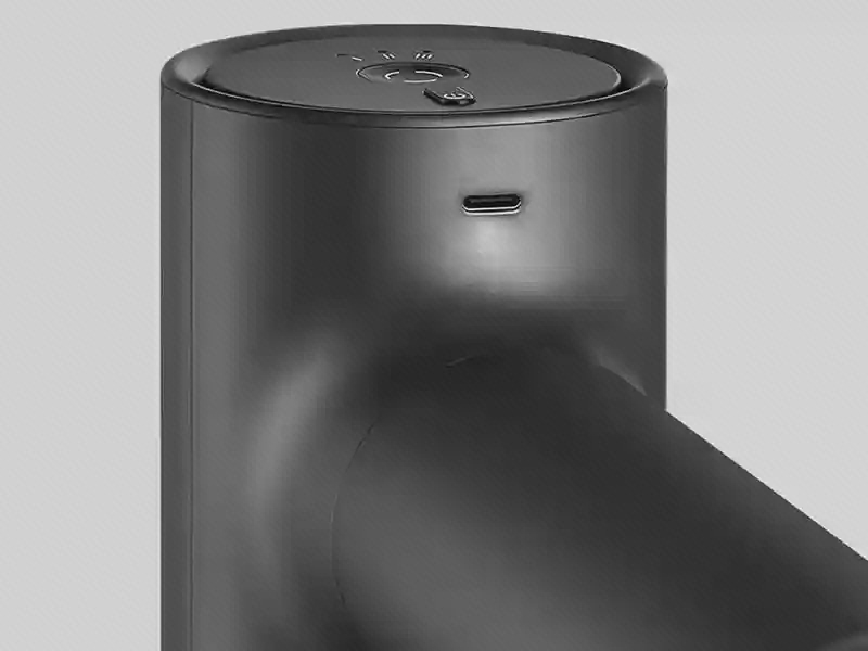 نمای نزدیک درگاه USB Type-C پشت بدنهٔ ماساژور میجیا زیر لبهٔ پنل گرد کنترل